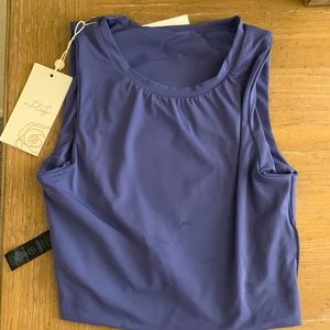 Size 4 Vitality tank. Never worn. Doesn’t fit and can’t return